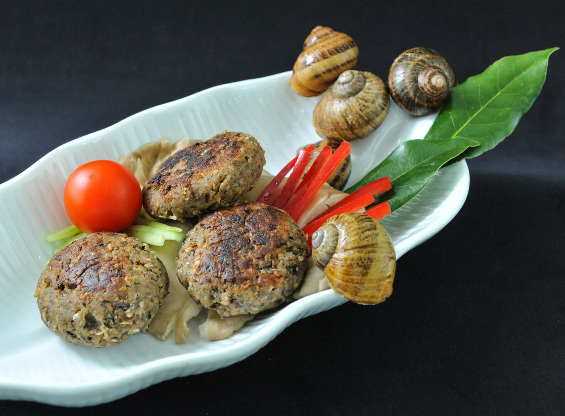 Burger made of pure minced snail fillet