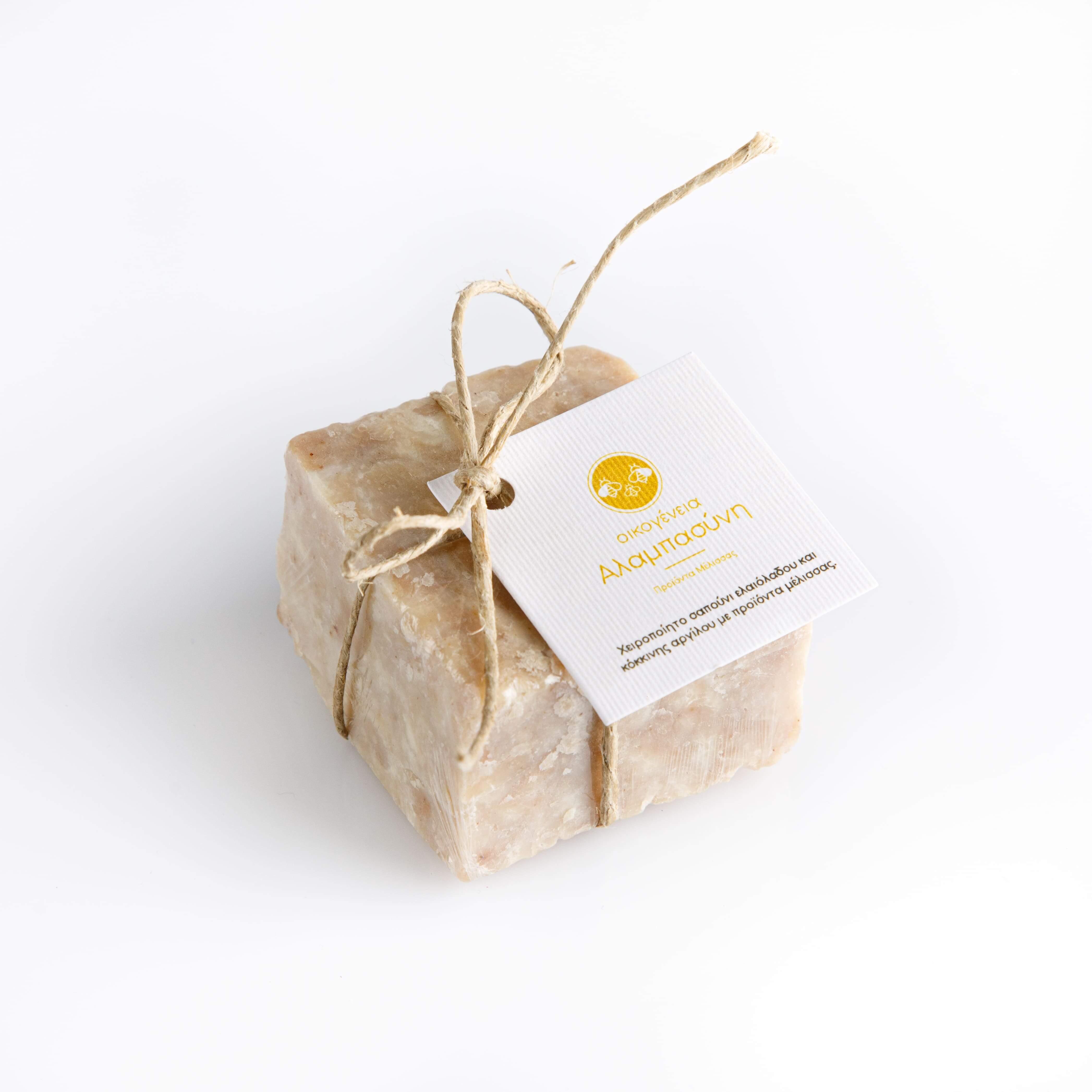 Handmade olive oil soap and red clay with bee products