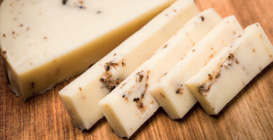 Yellow cheese with black truffle